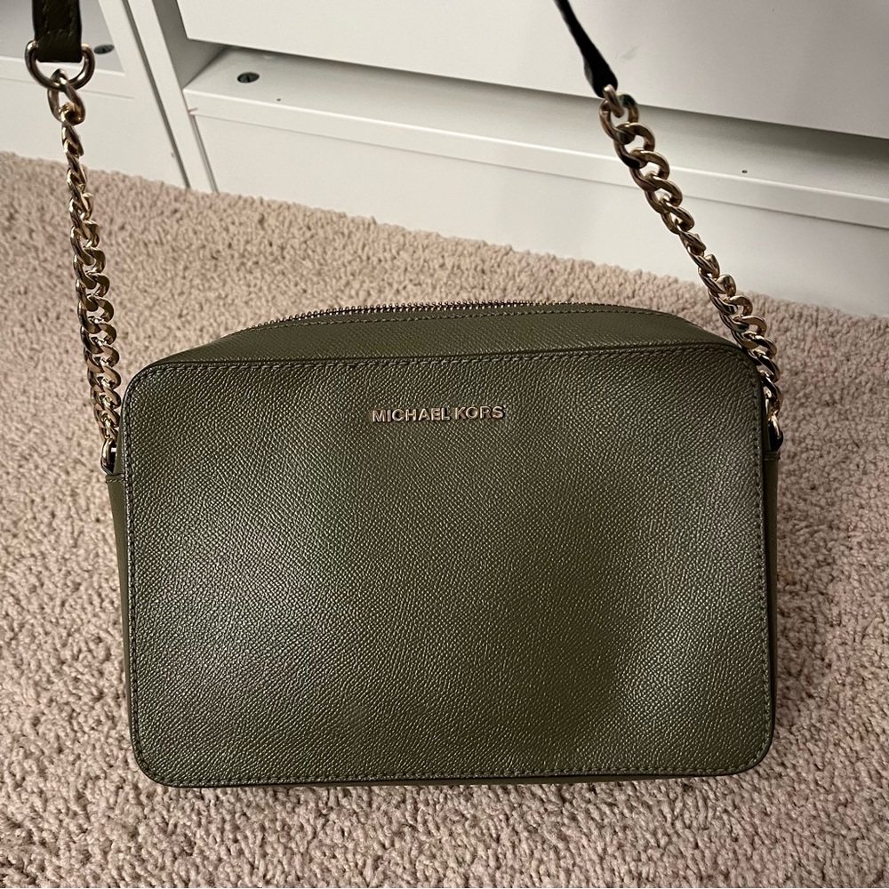Michael Kors crossbody bag in army green with gold details.